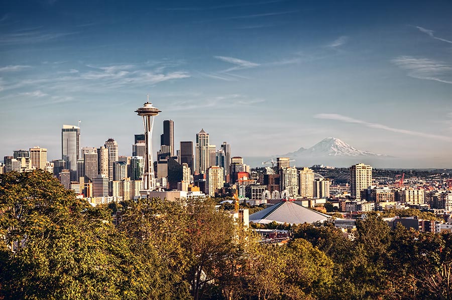 Downtown Seattle Space Needle and Mount Rainier at sunset