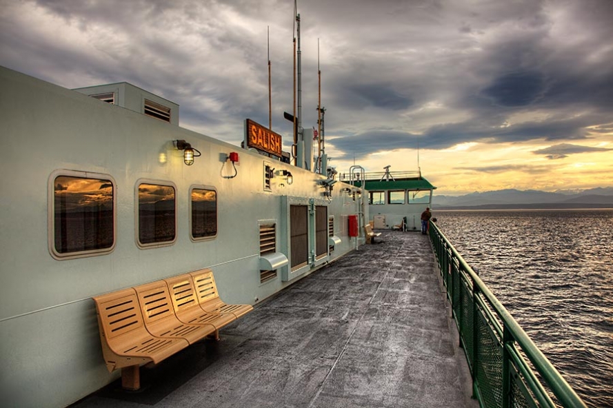 sunset on the ferry from whidbey island to port townsend in the pacific northwest of the usa