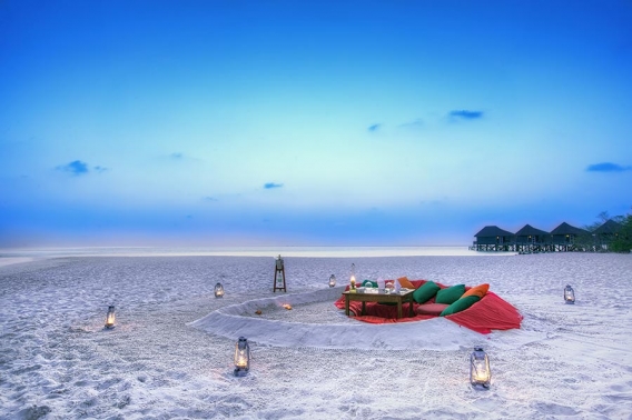 wedding breakfast table on the beach at kuredu in the maldives